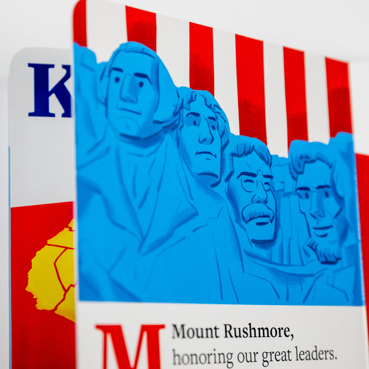 PragerU The ABCs of America board book for babies and toddlers, featuring colorful illustrations of American symbols and letters.