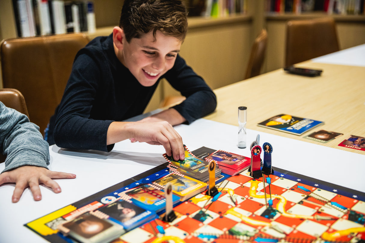PragerU Celebrate America Race to The White House board game showing game box with patriotic design and game pieces.