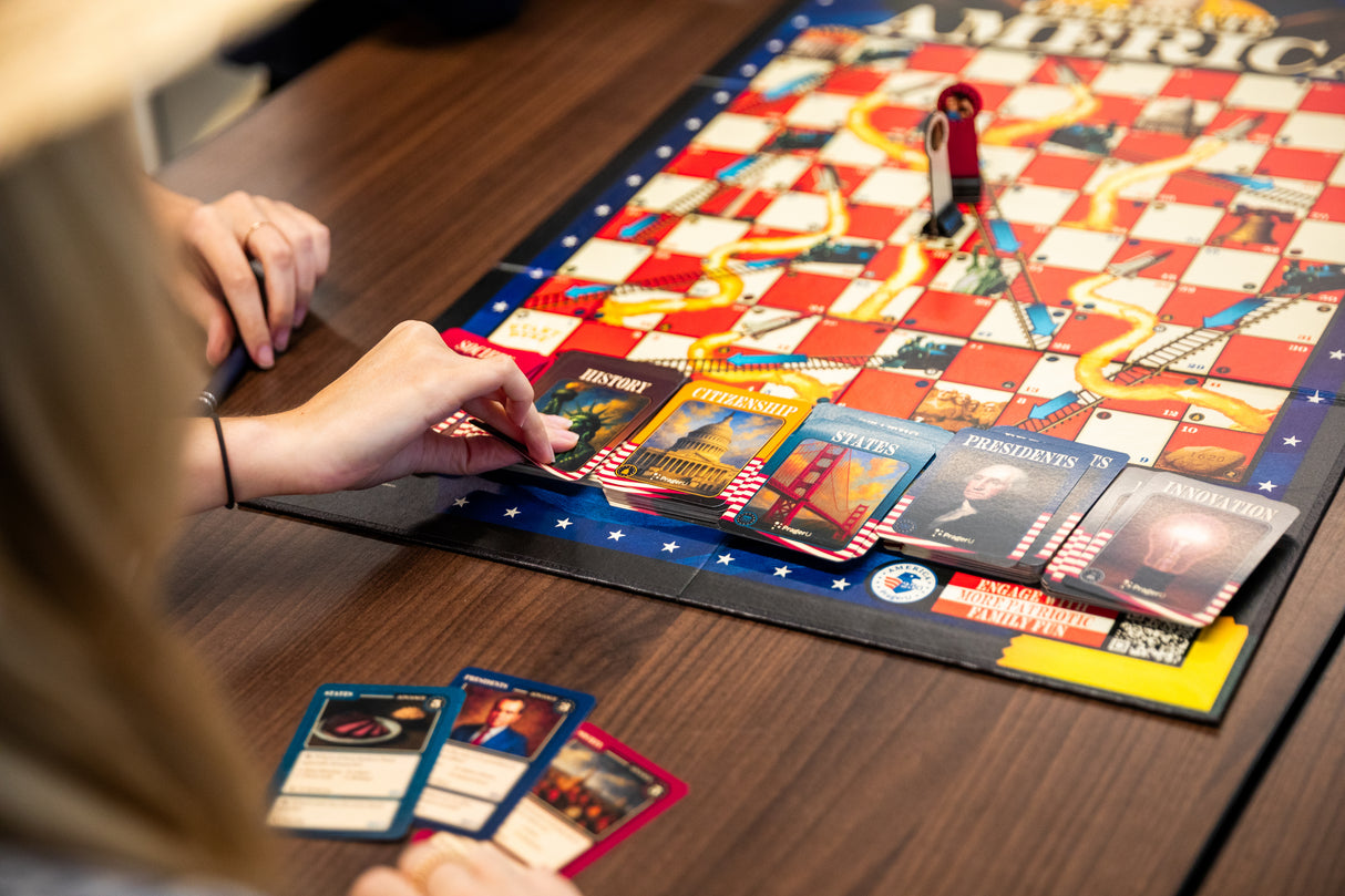 PragerU Celebrate America Race to The White House board game, featuring colorful game pieces and a game board for educational fun.