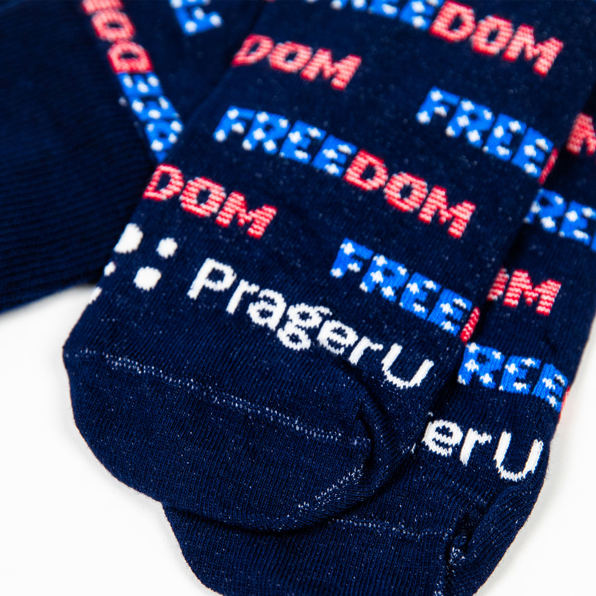 Set of three USA-made PragerU Freedom Socks featuring American flag designs on comfortable, patriotic socks.