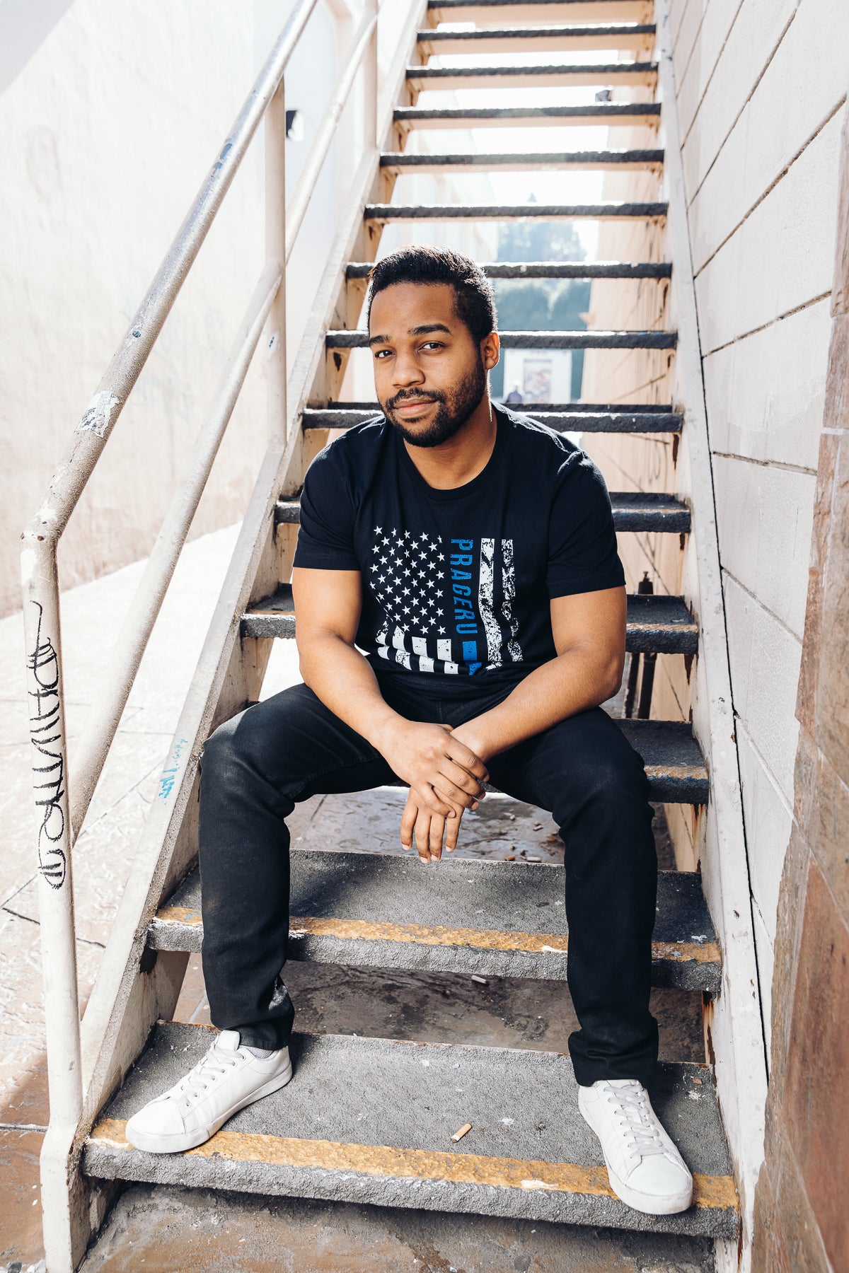 Blue distressed flag T-shirt by PragerU with Thin Blue Line design, featuring a worn, vintage-style American flag graphic.