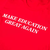 PragerU Make Education Great Again T-Shirt shown in black with slogan printed on front, casual crew neck design.