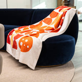 PragerU throw blanket with soft fabric and printed logo, perfect for cozying up on a couch or bed.