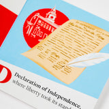 PragerU's "The ABCs of America" board book for babies and toddlers, featuring colorful pages with alphabet and American symbols.