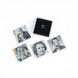 PragerU coaster set with four round coasters featuring educational designs, made of cork and ceramic for protecting surfaces.