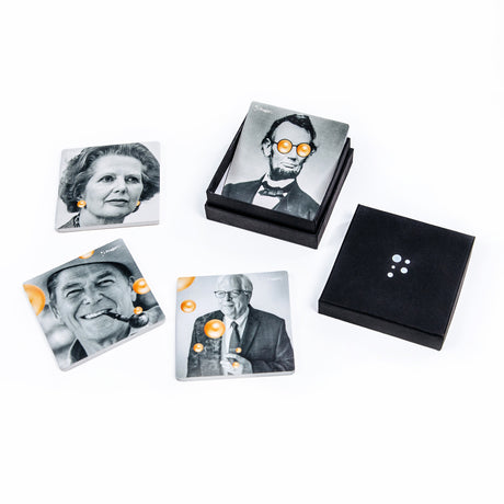 PragerU coaster set featuring four round coasters with educational slogans and logo, ideal for protecting surfaces.