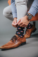 PragerU Freedom Sock 3-Pack featuring USA flag socks, made in the USA, with patriotic red, white, and blue flag designs.