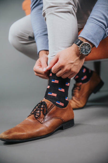 PragerU Freedom Sock 3-Pack featuring USA flag socks, made in the USA, with patriotic red, white, and blue flag designs.