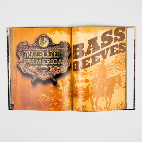 Hardcover book titled "Trailblazers of America: Heroes of the Frontier" by PragerU, featuring a detailed cover design.