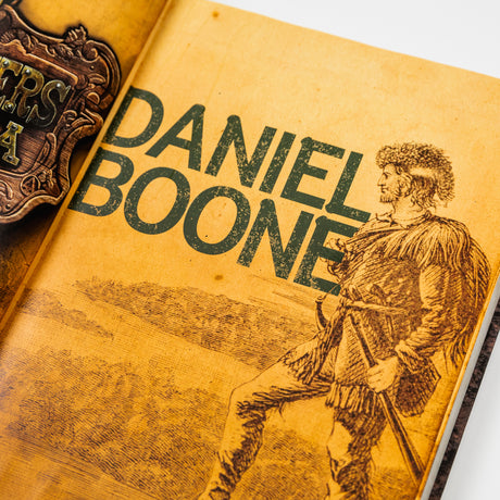 Hardcover book titled "Trailblazers of America: Heroes of the Frontier" by PragerU, featuring a plain cover with text.