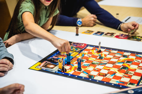 PragerU Celebrate America Race to The White House board game showcasing patriotic themes and game components on a table.