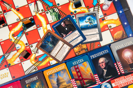 PragerU Celebrate America Race to The White House board game with colorful game board and game pieces on a table.