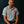 PragerU polo shirt in sport grey, men's size S, casual fit, featuring the PragerU logo on the chest.