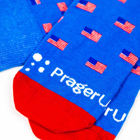 PragerU Freedom Sock 3-Pack featuring USA flag socks in blue with patriotic designs, made in the USA.