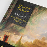 Cover image of The Rational Bible: Exodus by Regnery Faith, a book with biblical text and artwork on the front.