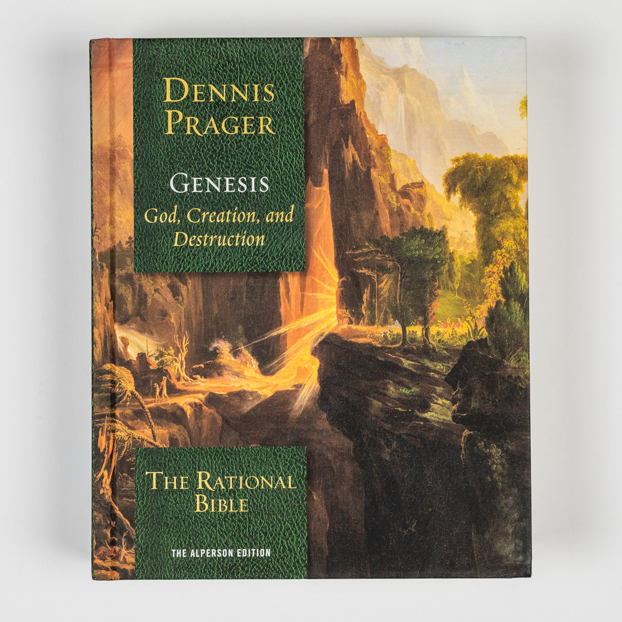 Cover of The Rational Bible Genesis by Regnery Faith, featuring the book's title and a religious-themed design.