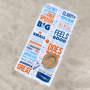 PragerU beach towel featuring vibrant design, made for comfortable lounging at the beach or poolside.