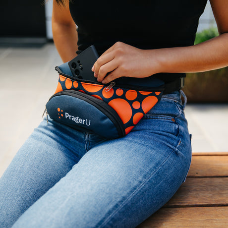 PragerU sling bag fanny pack with adjustable strap, black fabric, compact design for casual wear and hands-free convenience.