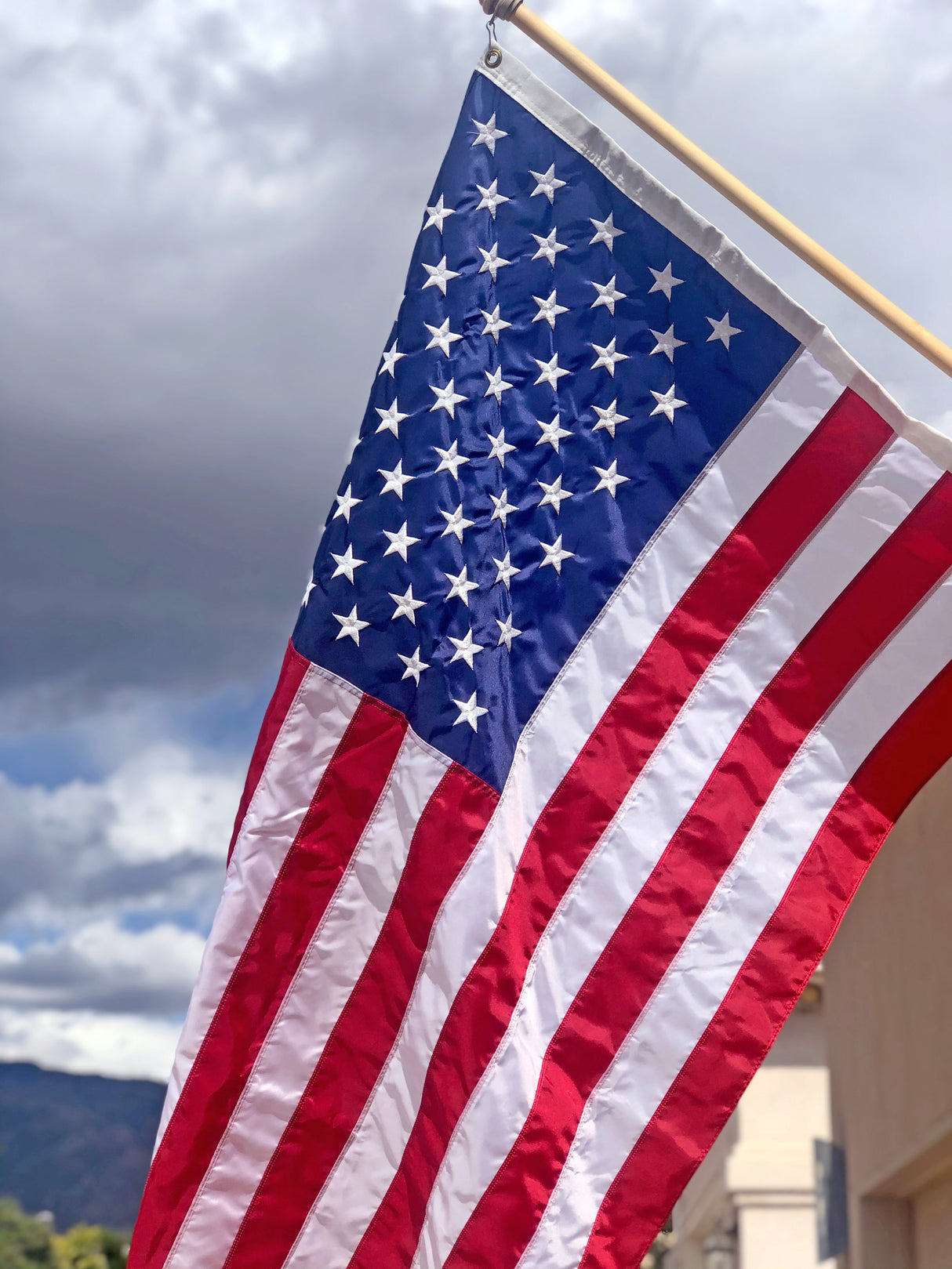 PragerU USA outdoor flag featuring the stars and stripes, suitable for display on a flagpole or outdoor setting.