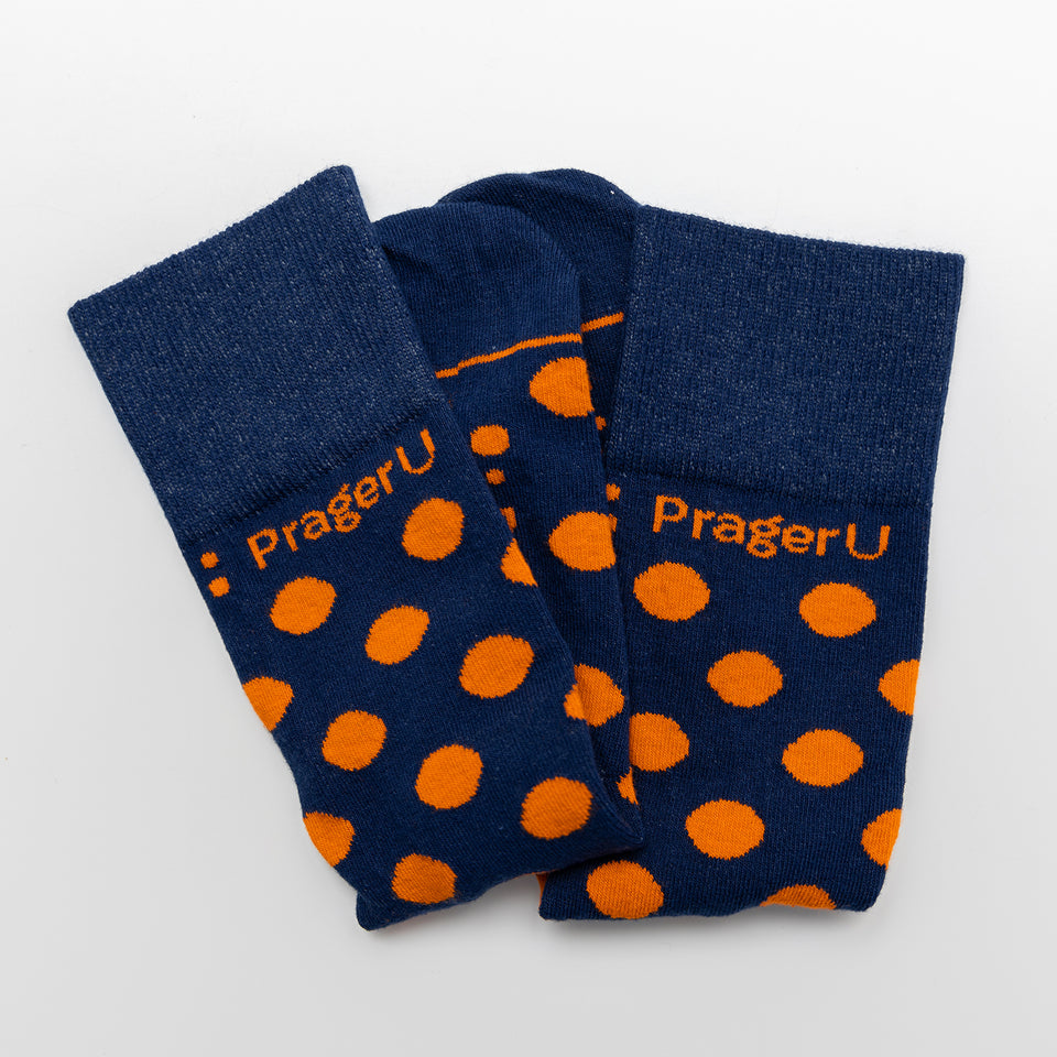 PragerU Dot Socks featuring a pattern of small white dots on black fabric, casual unisex socks with comfortable fit.