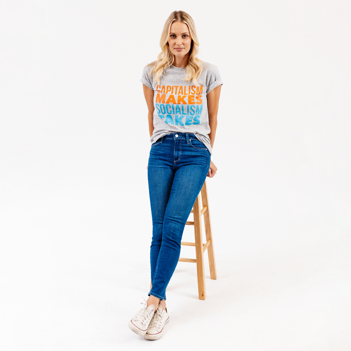PragerU Capitalism Makes T-Shirt in athletic heather, showcasing a casual fit and bold printed slogan on the front.