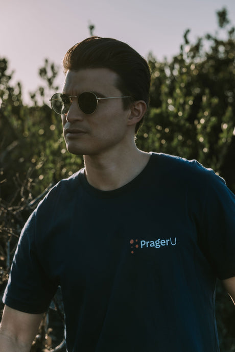 Black PragerU T-Shirt in XS size, featuring the PragerU logo and design on soft cotton fabric.